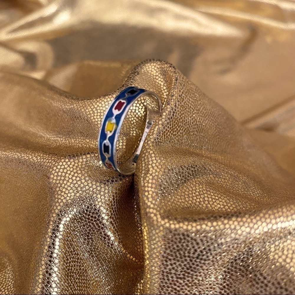 Sterling Silver Band Ring with Red, Yellow , Blue & Black  design.